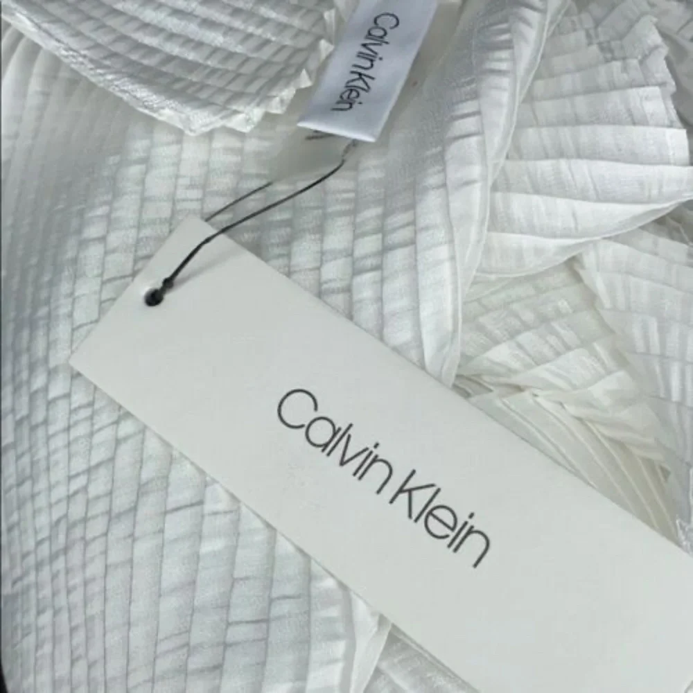 Calvin Klein accordion pleating